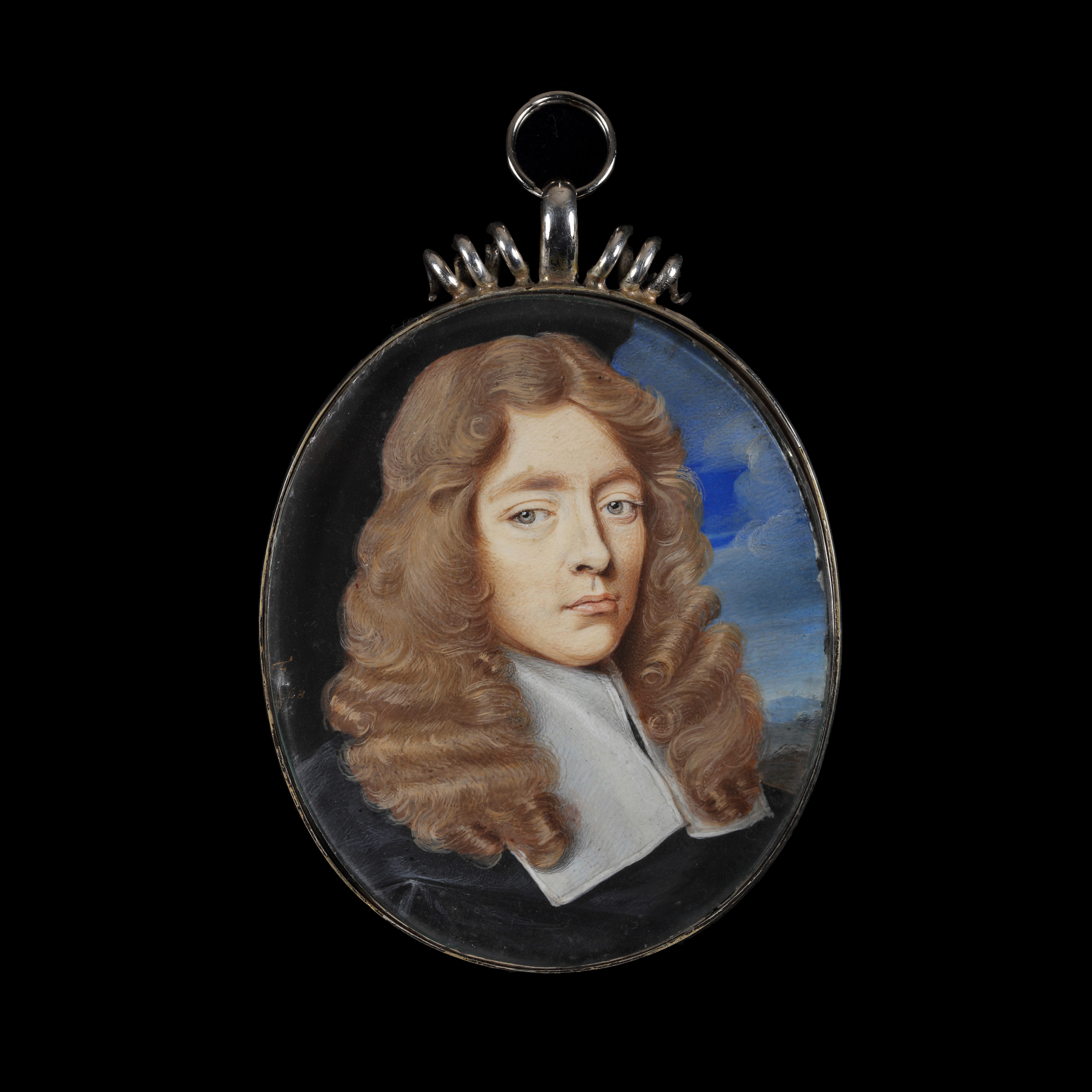 Portrait miniature of a Young Gentleman, wearing black robes and white lawn collar; landscape and cloudy sky background